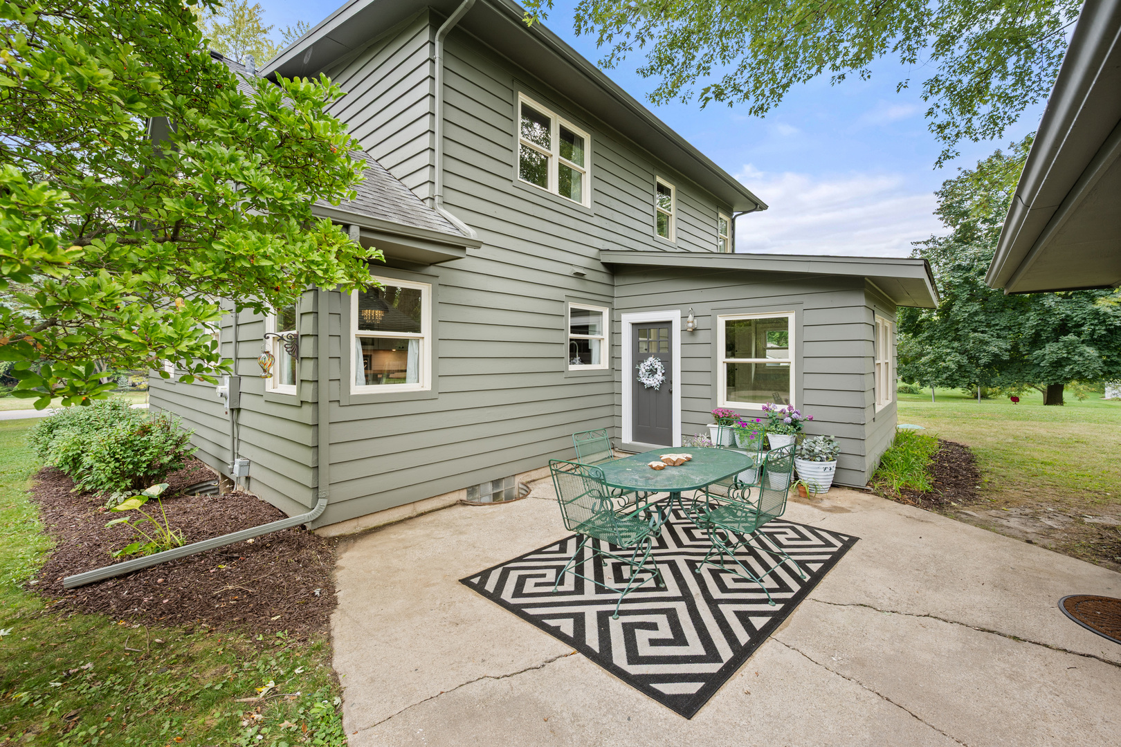 40w897 Brown Road St. Charles, IL 60175 - Photo 3 of 35 a front view of a house with garden