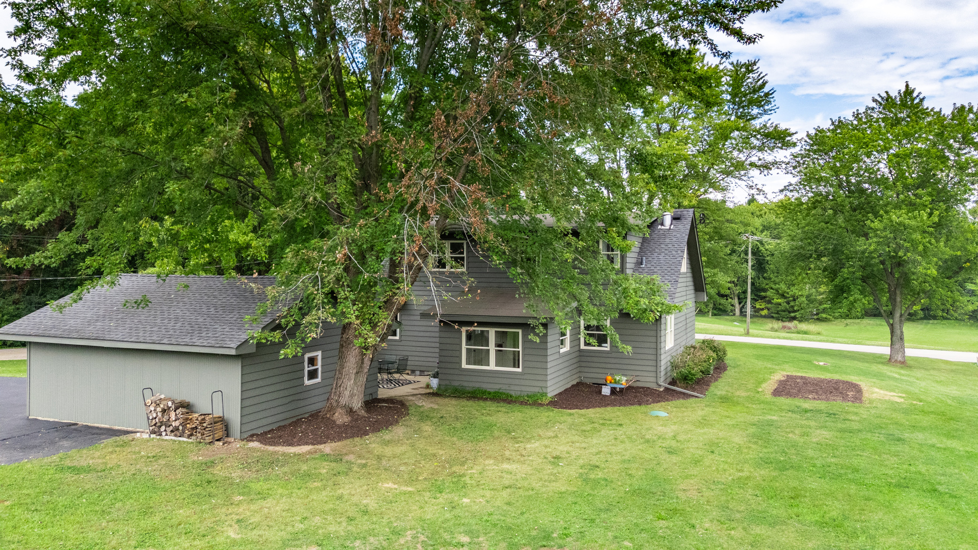 40w897 Brown Road St. Charles, IL 60175 - Photo 32 of 35 a view of a house with backyard and a tree