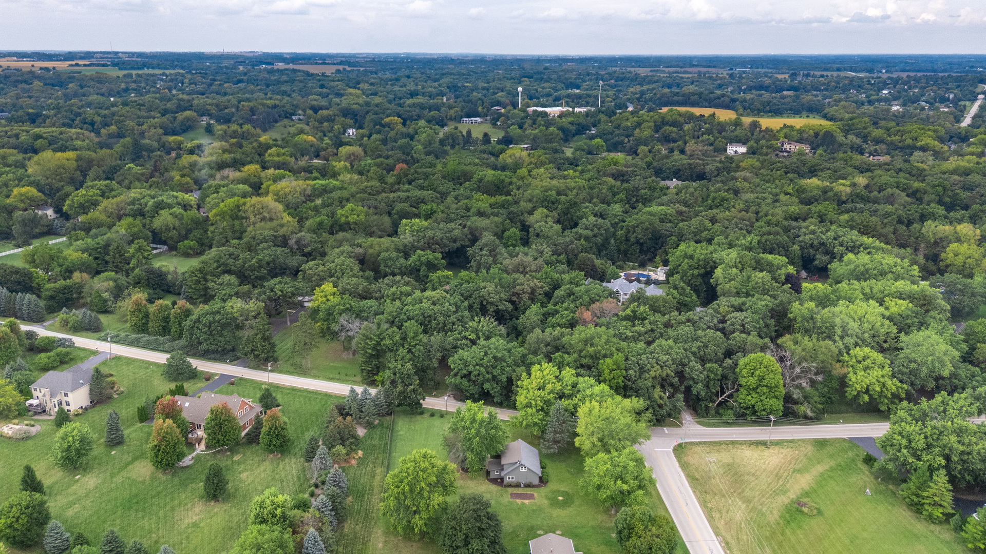 40w897 Brown Road St. Charles, IL 60175 - Photo 34 of 35 a view of a forest with a houses