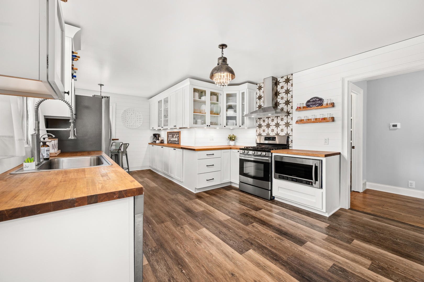 40w897 Brown Road St. Charles, IL 60175 - Photo 7 of 35 a large kitchen with stainless steel appliances granite countertop a stove and a sink