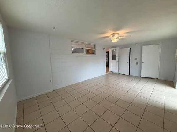 a view of an empty room and window