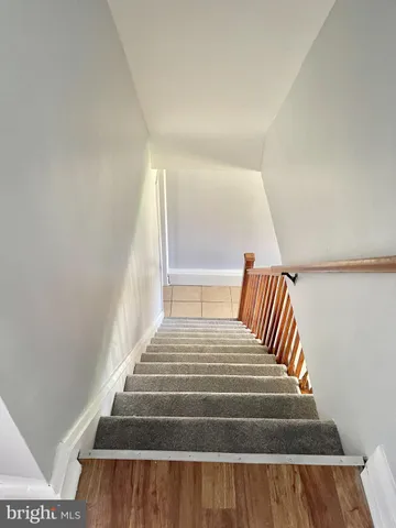 a view of bedroom with wooden floor