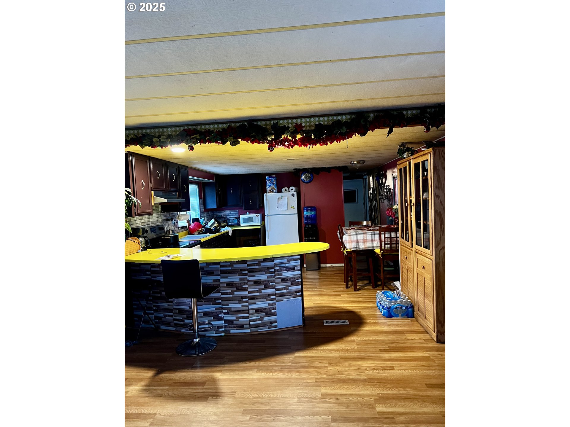 1030 Southwest 11th Street, Unit 33 Hermiston, OR 97838 - Photo 3 of 12 a view of living room with furniture and a fireplace