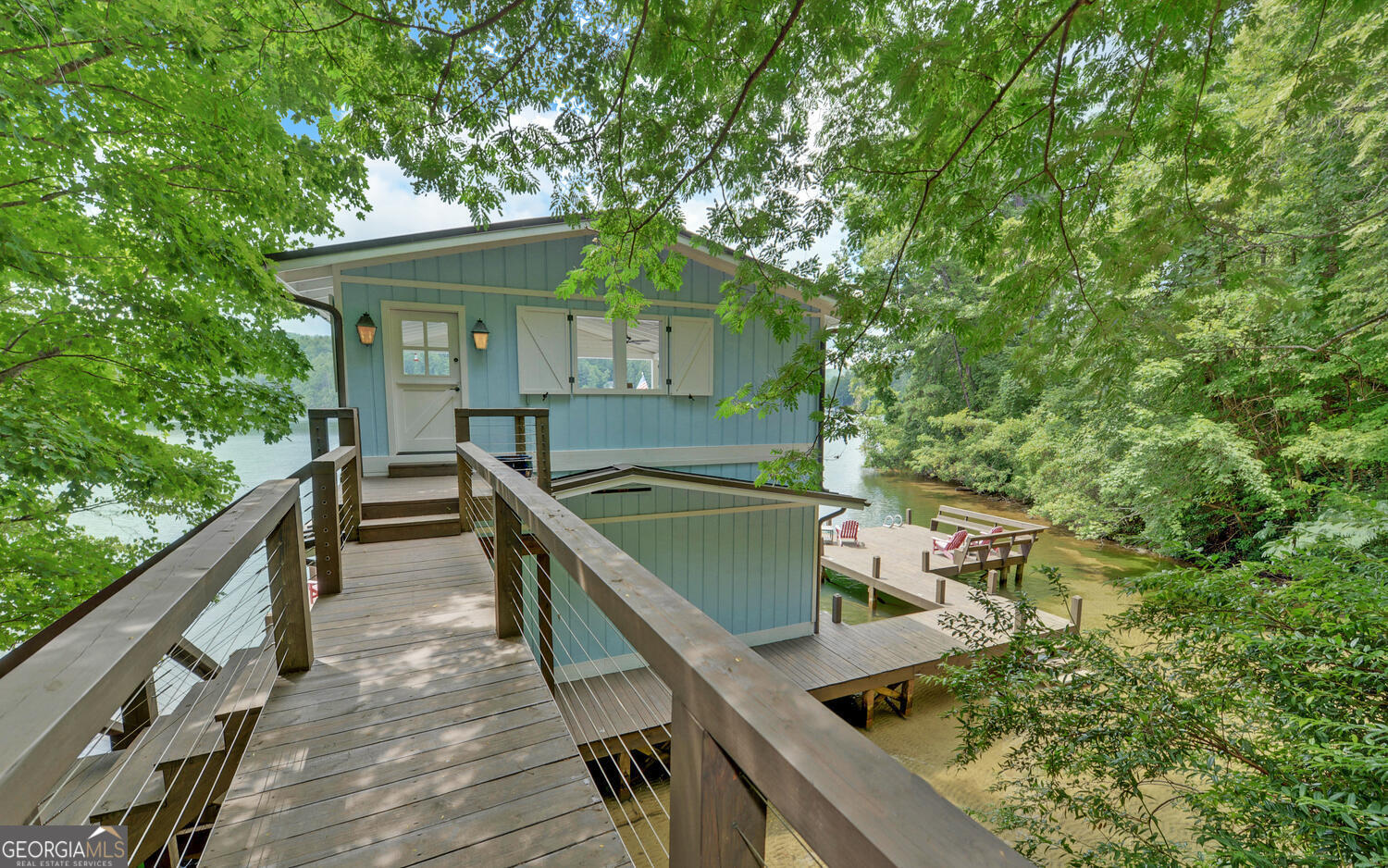3540 Lake Rabun Road Lakemont, GA 30552 - Photo 67 of 81 a balcony with wooden floor and outdoor seating