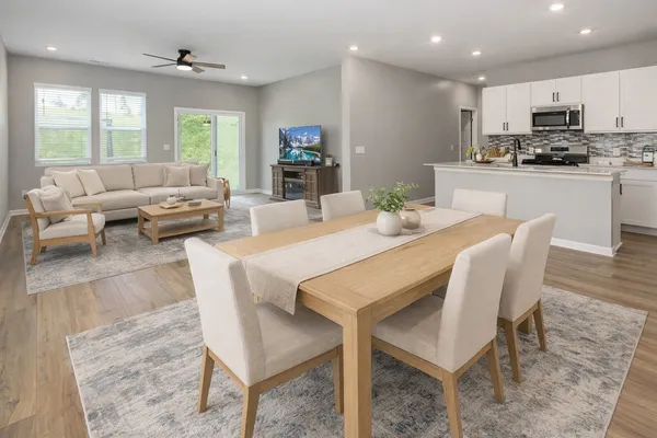 a view of a dining room with furniture