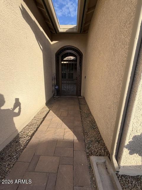 16121 West Berkeley Road Goodyear, AZ 85395 - Photo 5 of 20 a bedroom with a bed and a window