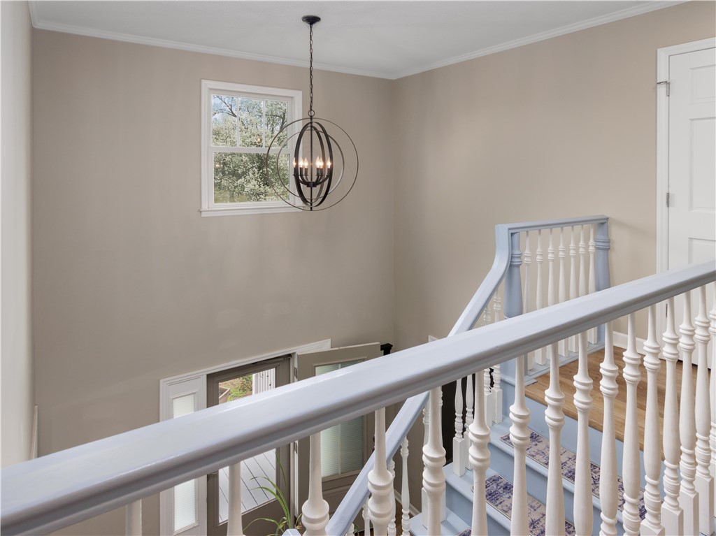 305 Farmdale Road Hodges, SC 29653 - Photo 22 of 48 This inviting stairway features charming balusters and abundant natural light.