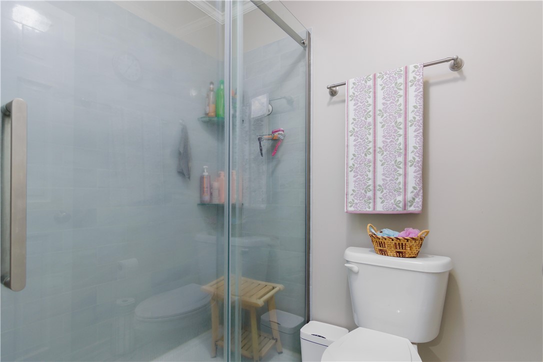 305 Farmdale Road Hodges, SC 29653 - Photo 27 of 48 This bright bathroom features a spacious shower with sleek glass enclosure.