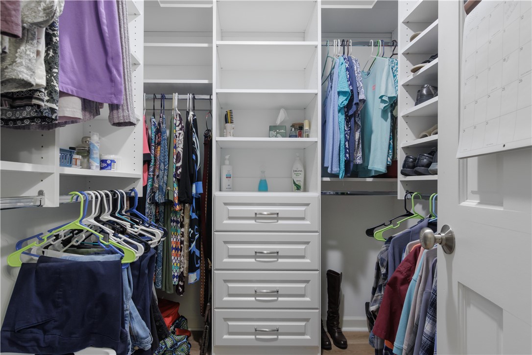 305 Farmdale Road Hodges, SC 29653 - Photo 28 of 48 This spacious walk-in closet features ample storage solutions for an organized and functional dressing area.