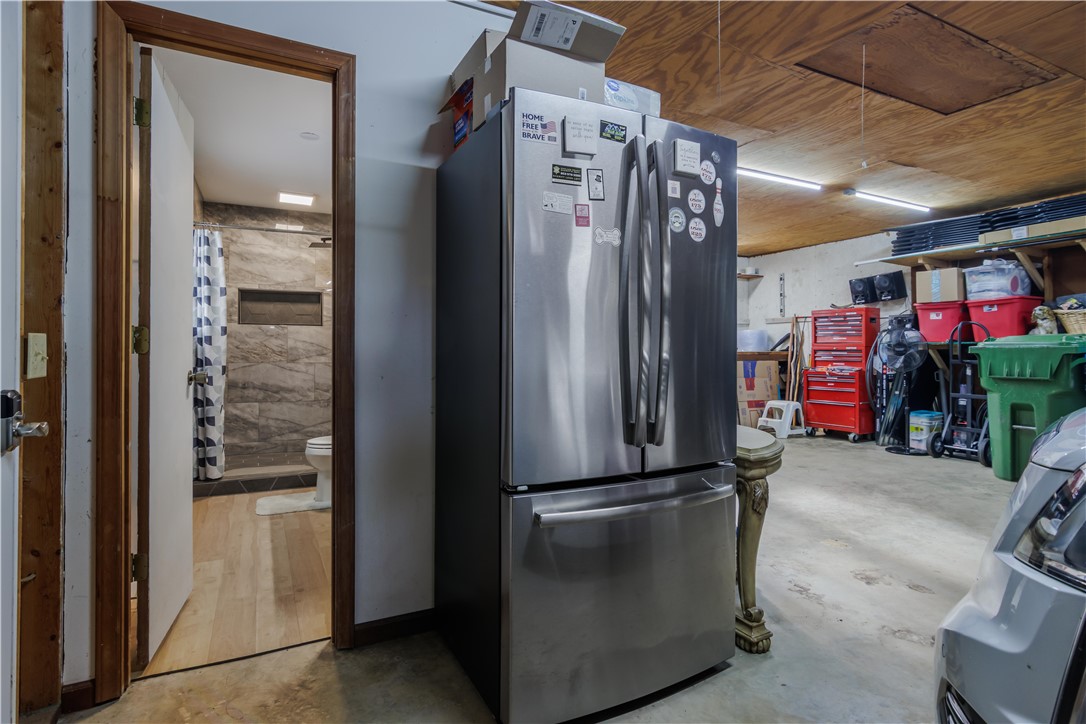 305 Farmdale Road Hodges, SC 29653 - Photo 35 of 48 This versatile space offers practical storage and a convenient adjacent bathroom.