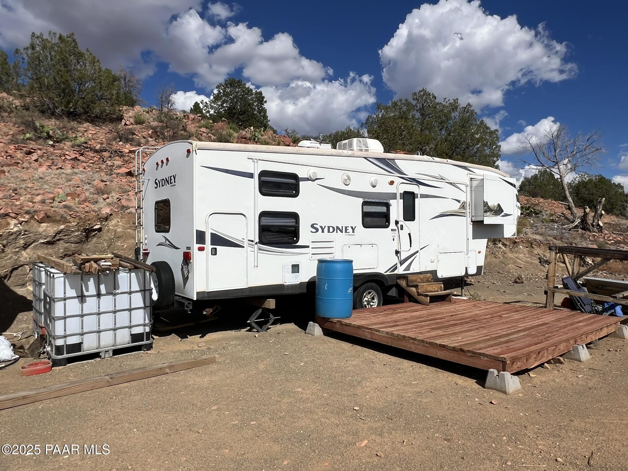 296 Quartz Hill Road Ash Fork, AZ 86320 - Photo 2 of 13 a aerial view of a house with a yard