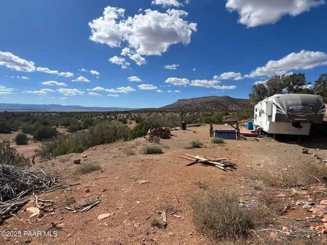 a view of a backyard of the house