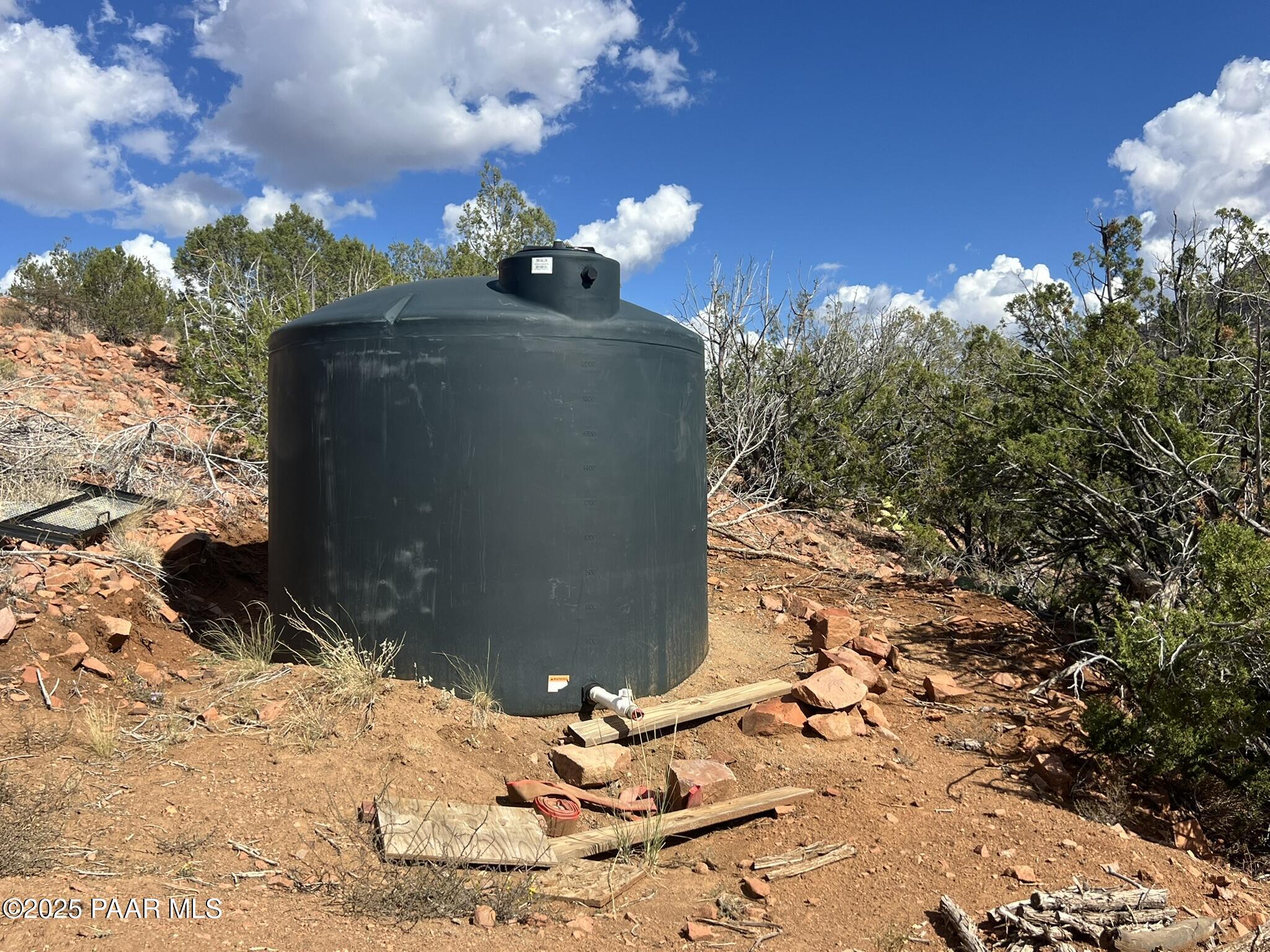 296 Quartz Hill Road Ash Fork, AZ 86320 - Photo 5 of 13 a view of a backyard of the house