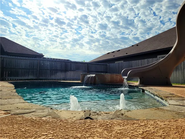 a view of a backyard with a sink