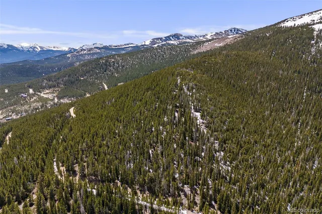 a view of a lake with a building in the background