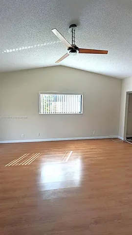 a view of a room and window