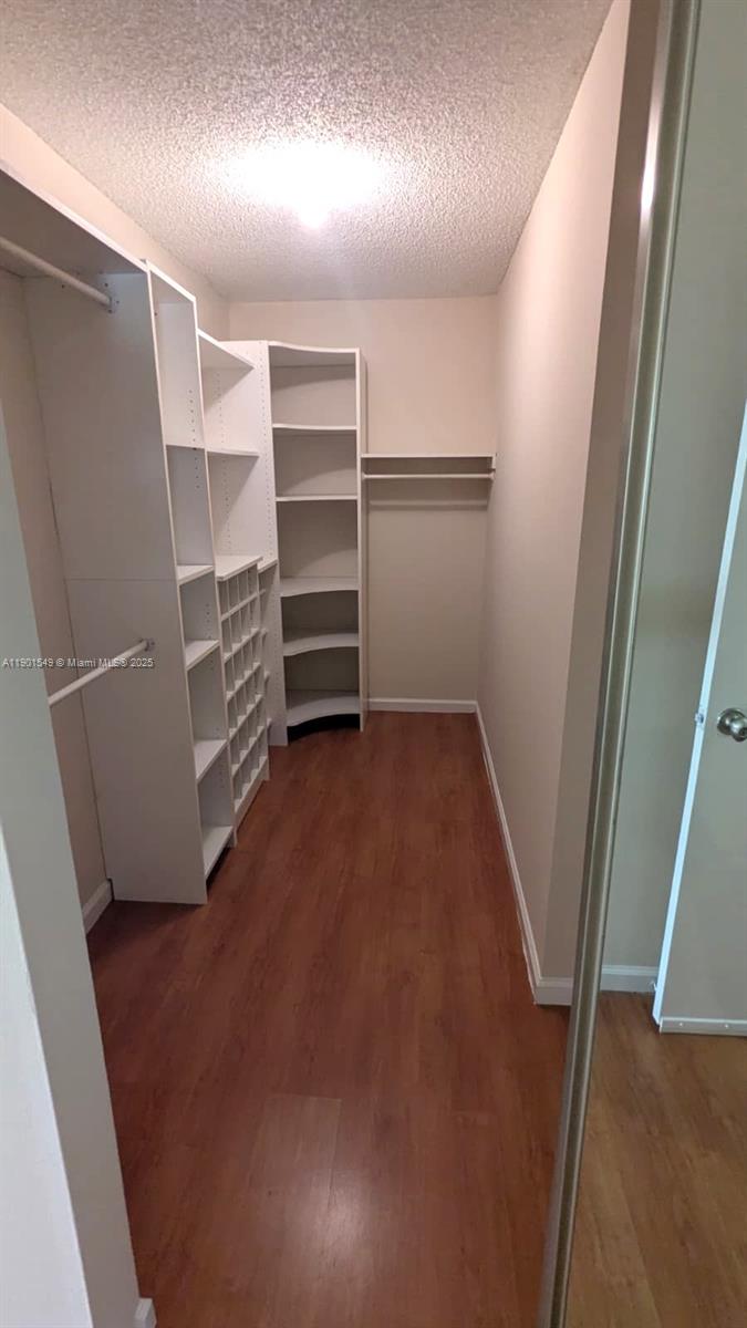 10140 Torchwood Avenue Plantation, FL 33324 - Photo 16 of 18 wooden floor in an empty room