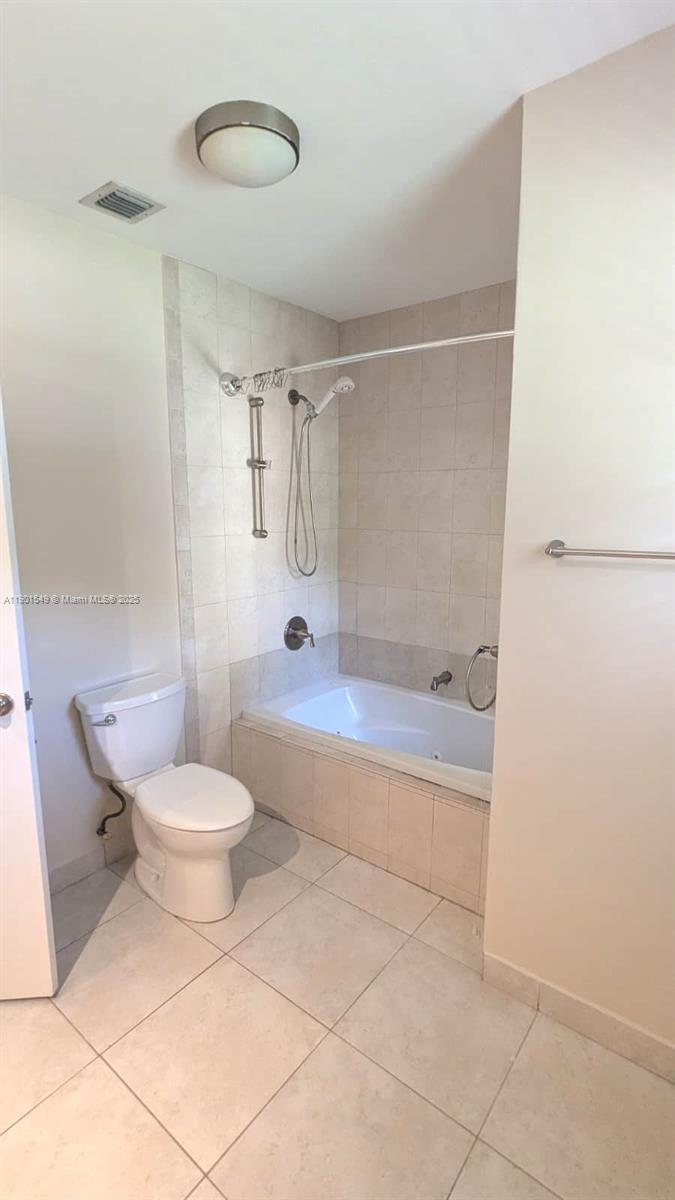 10140 Torchwood Avenue Plantation, FL 33324 - Photo 18 of 18 a bathroom with a toilet and a shower