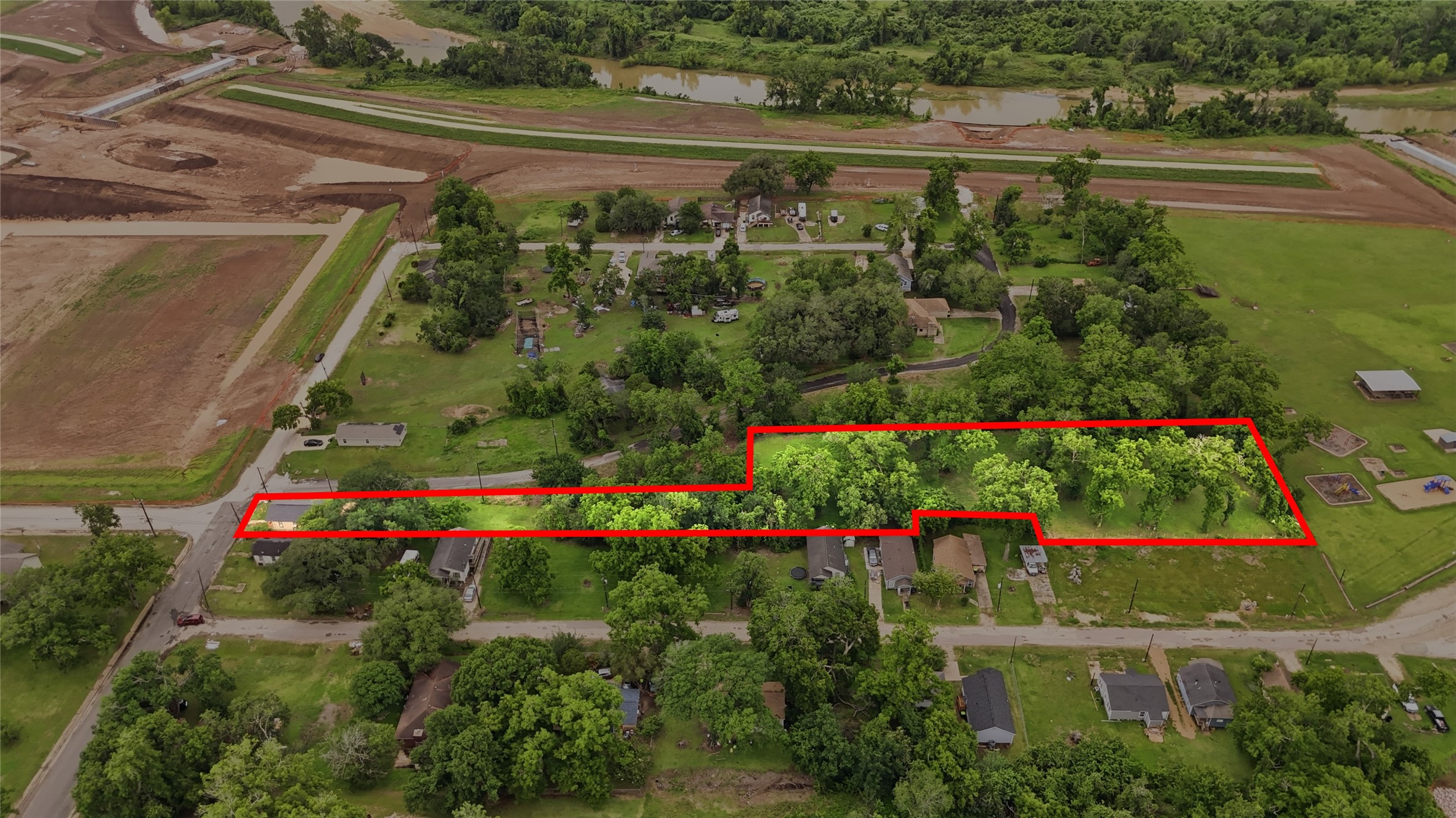 101 Outlar Street Wharton, TX 77488 - Photo 28 of 40 a view of a garden with flowers and trees