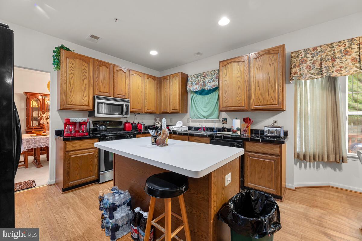 10105 Cudby Court Lanham, MD 20706 - Photo 11 of 44 Chef Caliber Kitchen with Island & lots of storage