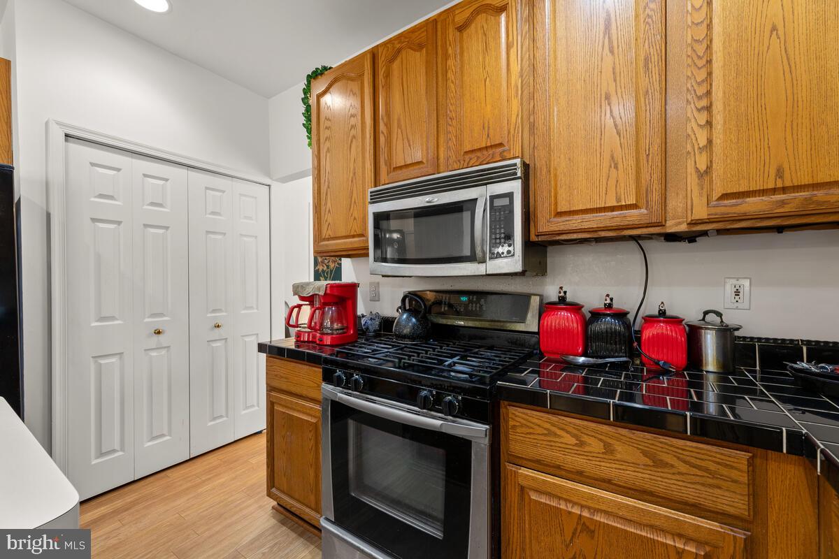10105 Cudby Court Lanham, MD 20706 - Photo 12 of 44 The kitchen features gas cooking & a large pantry