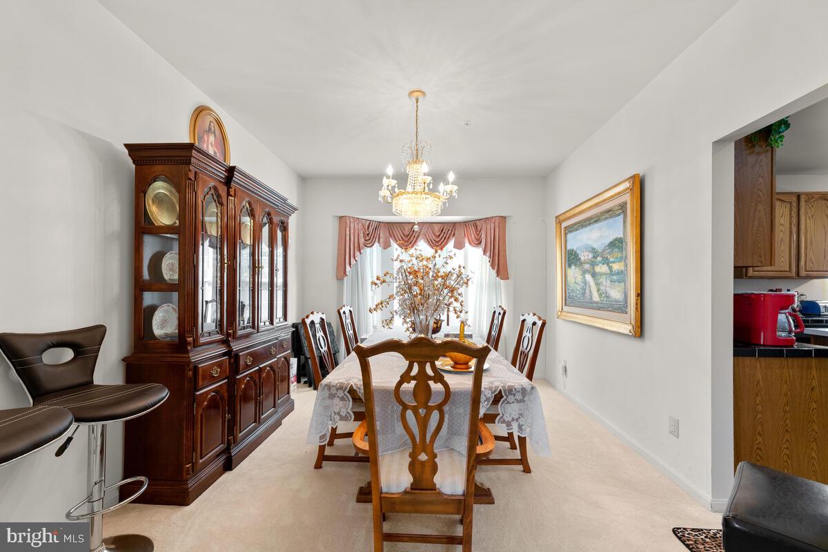 10105 Cudby Court Lanham, MD 20706 - Photo 8 of 44 Formal Dining Room with Bay Window opens to Kit.