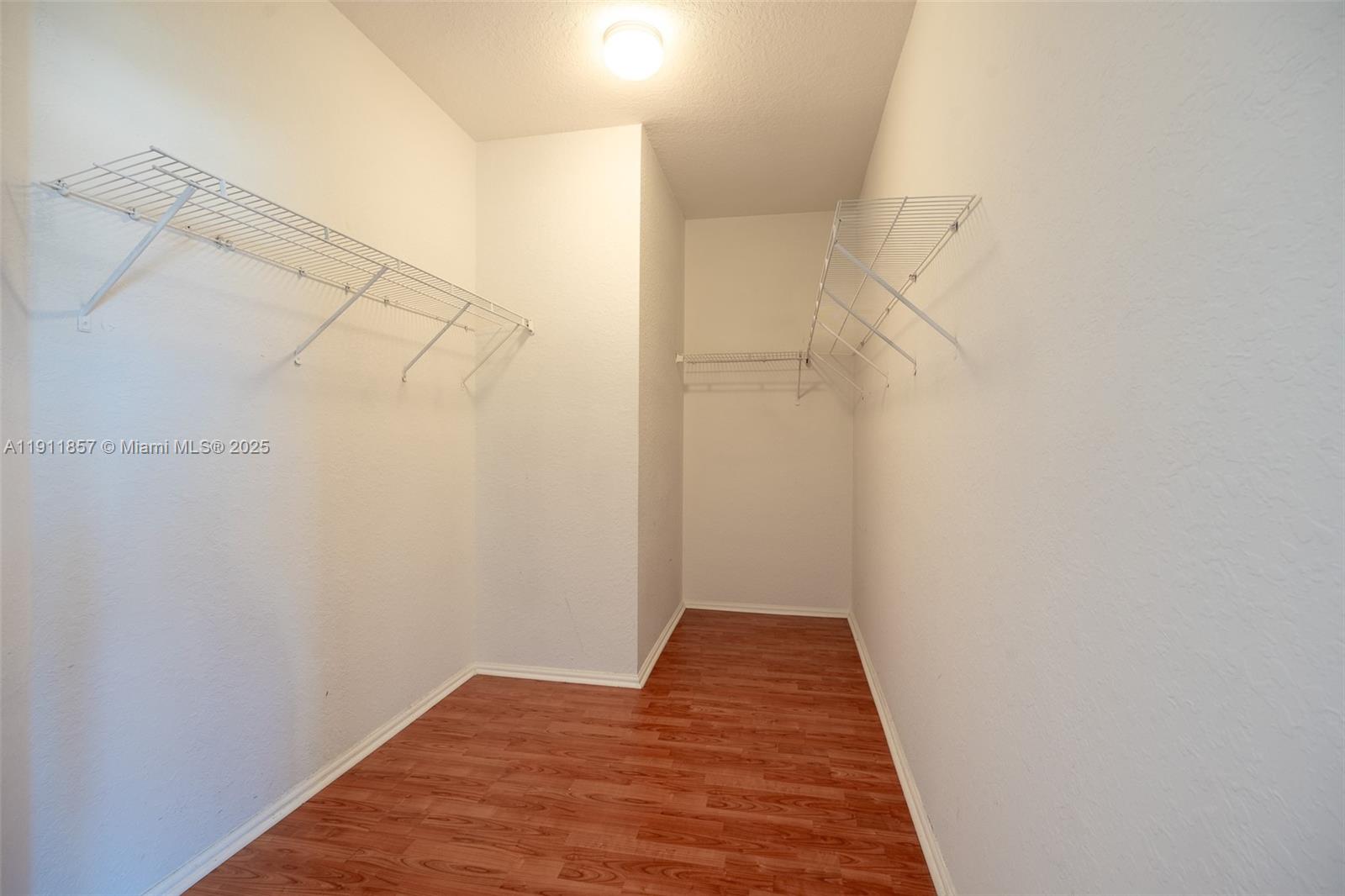 1770 Northeast 37th Place Homestead, FL 33033 - Photo 26 of 39 a view of hallway with wooden floor