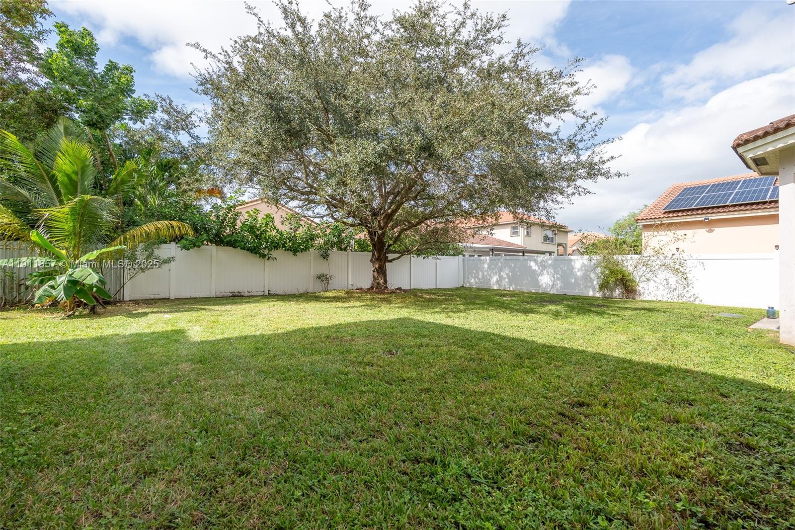 1770 Northeast 37th Place Homestead, FL 33033 - Photo 7 of 39 a view of a house with a yard
