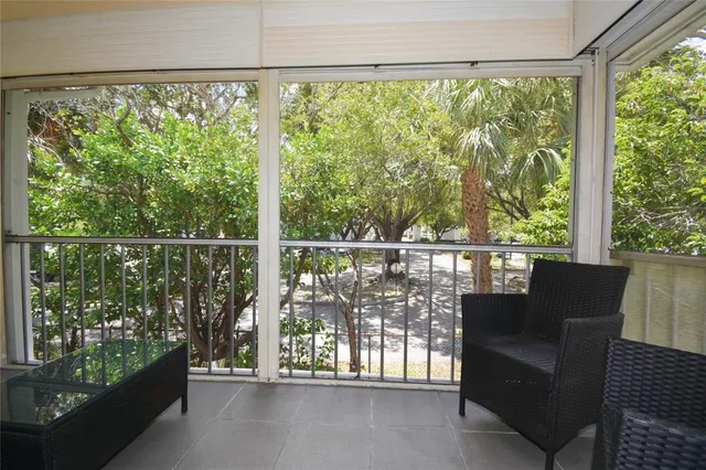 a view of a two chair in the balcony
