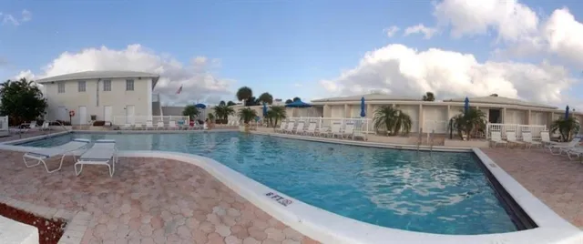 a view of a house with a swimming pool