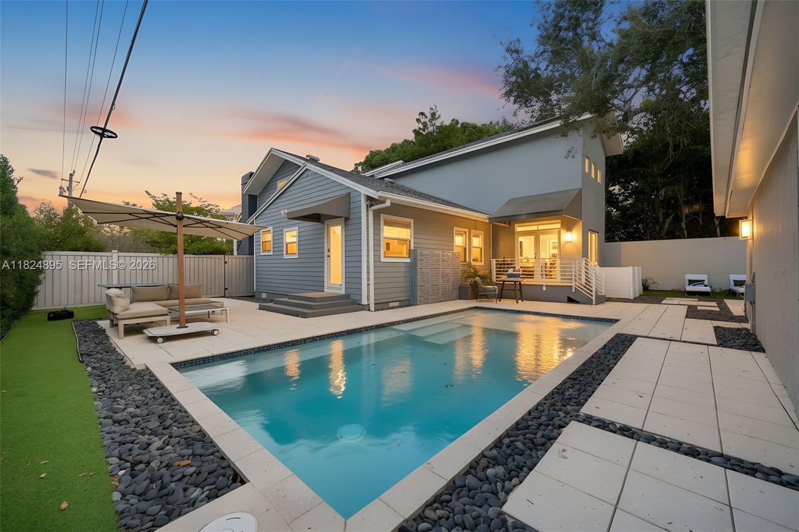 150 Northeast 50th Street, Unit A Miami, FL 33137 - Photo 1 of 100 a view of swimming pool with outdoor seating