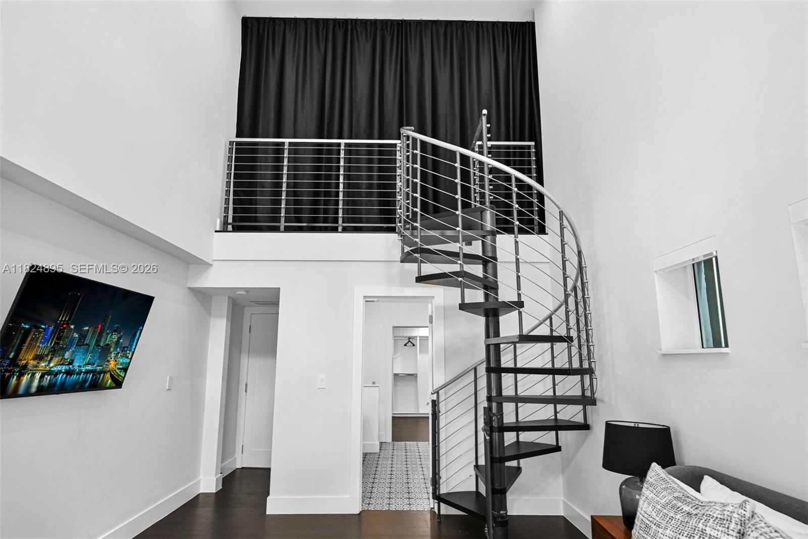150 Northeast 50th Street, Unit A Miami, FL 33137 - Photo 21 of 100 a view of entryway and hall with wooden floor