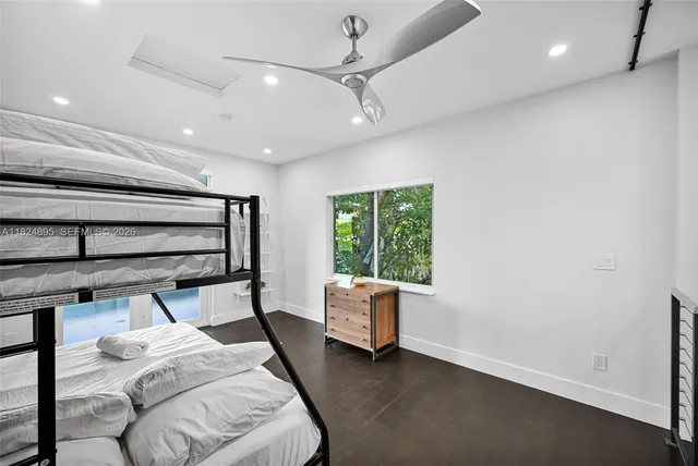 a view of a livingroom with furniture and a table