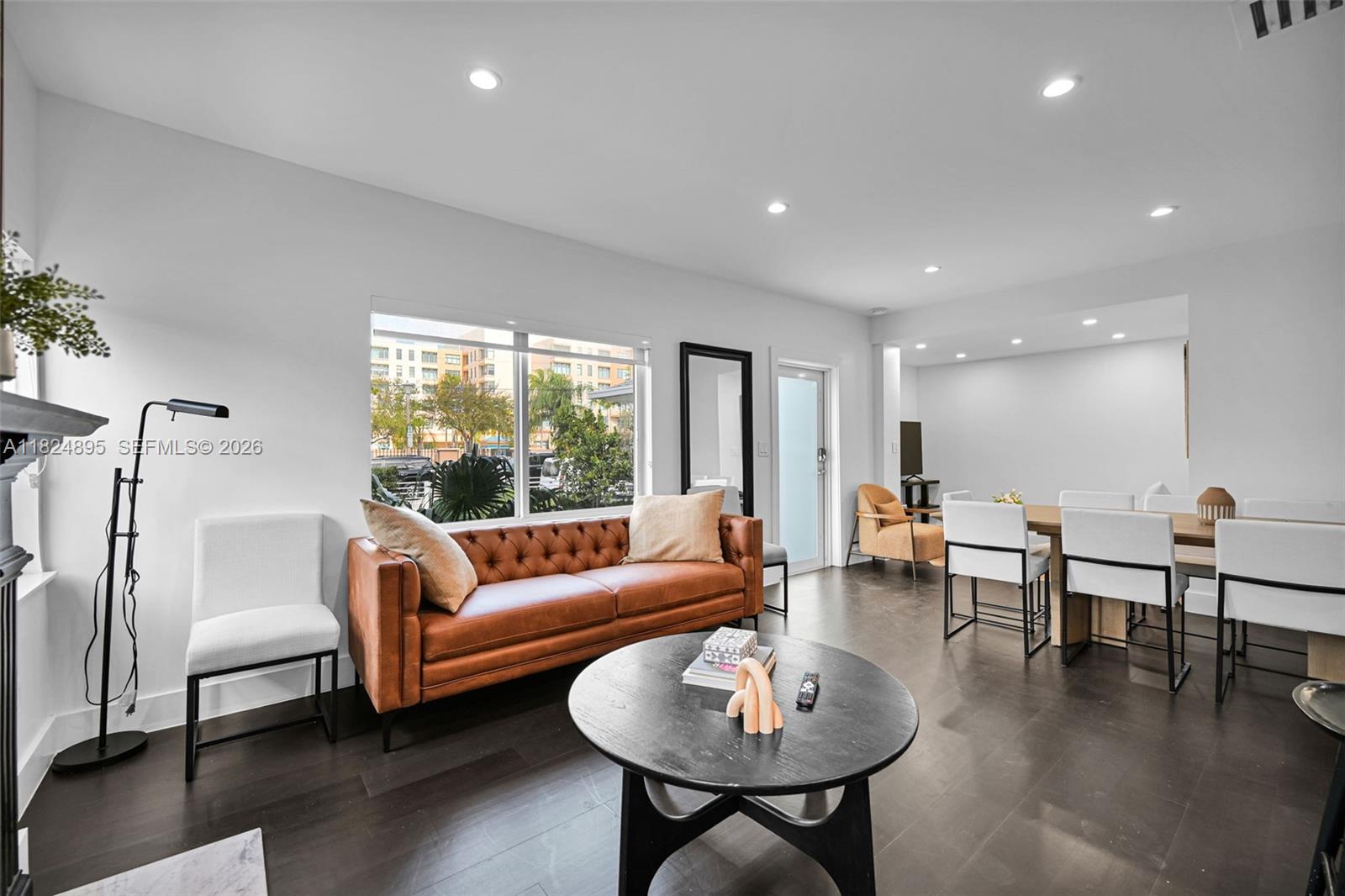 150 Northeast 50th Street, Unit A Miami, FL 33137 - Photo 44 of 100 a living room with furniture and a large window