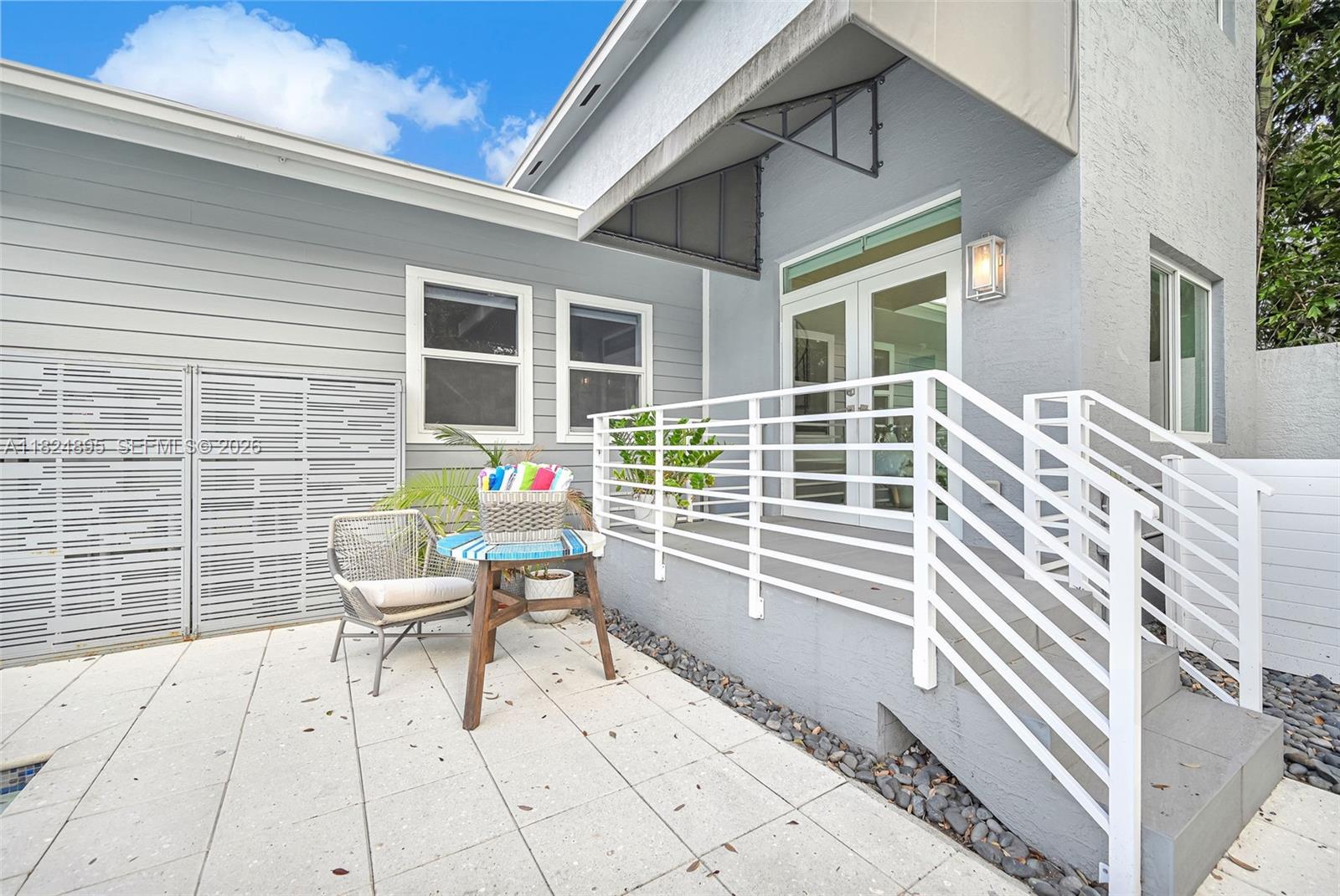 150 Northeast 50th Street, Unit A Miami, FL 33137 - Photo 89 of 100 a house view with a outdoor space