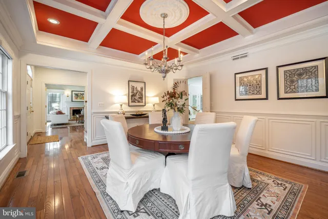 a kitchen with stainless steel appliances kitchen island granite countertop a refrigerator and a sink