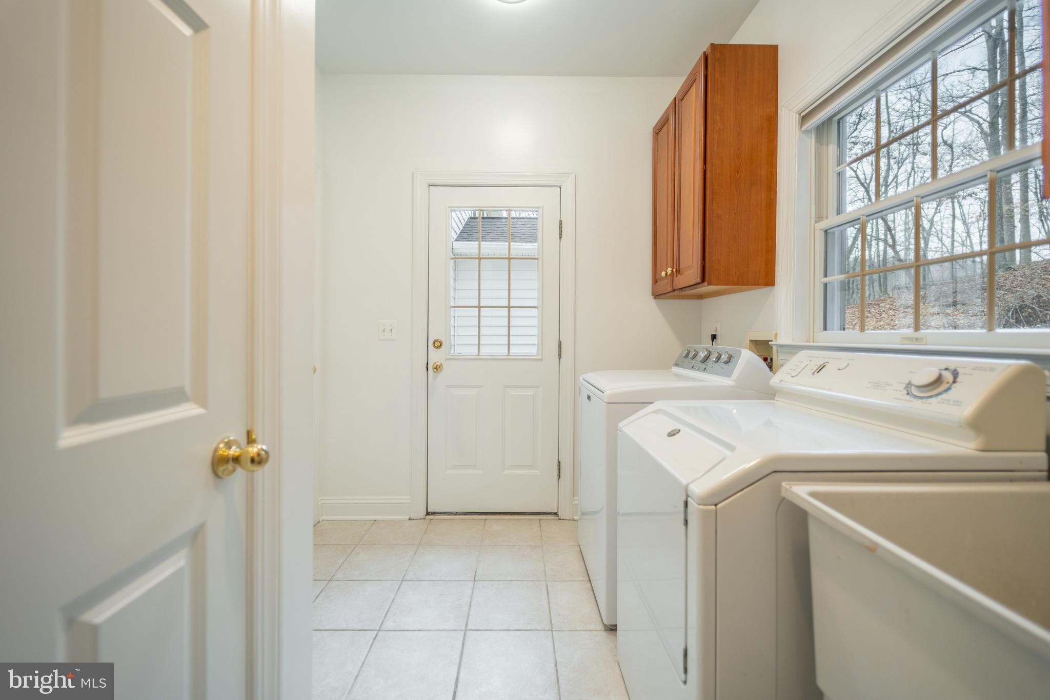 11112 Old Carriage Road Glen Arm, MD 21057 - Photo 26 of 83 Main Level Laundry with Exterior Entrance