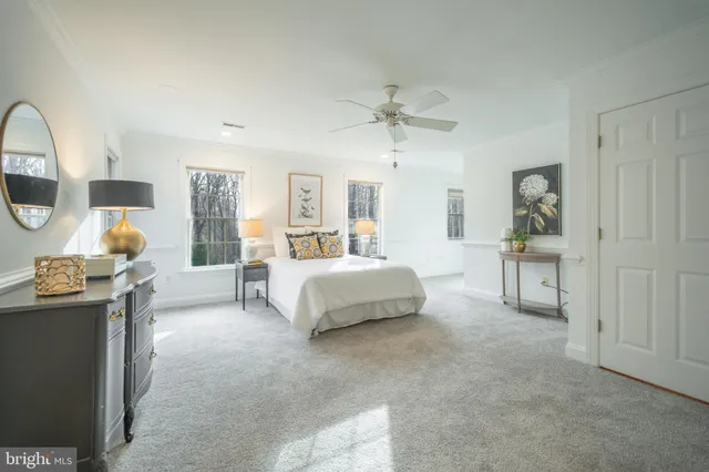 a bathroom with a sink a vanity and a mirror