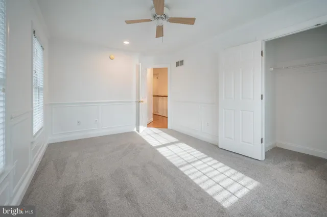 a view of a door with wooden walls