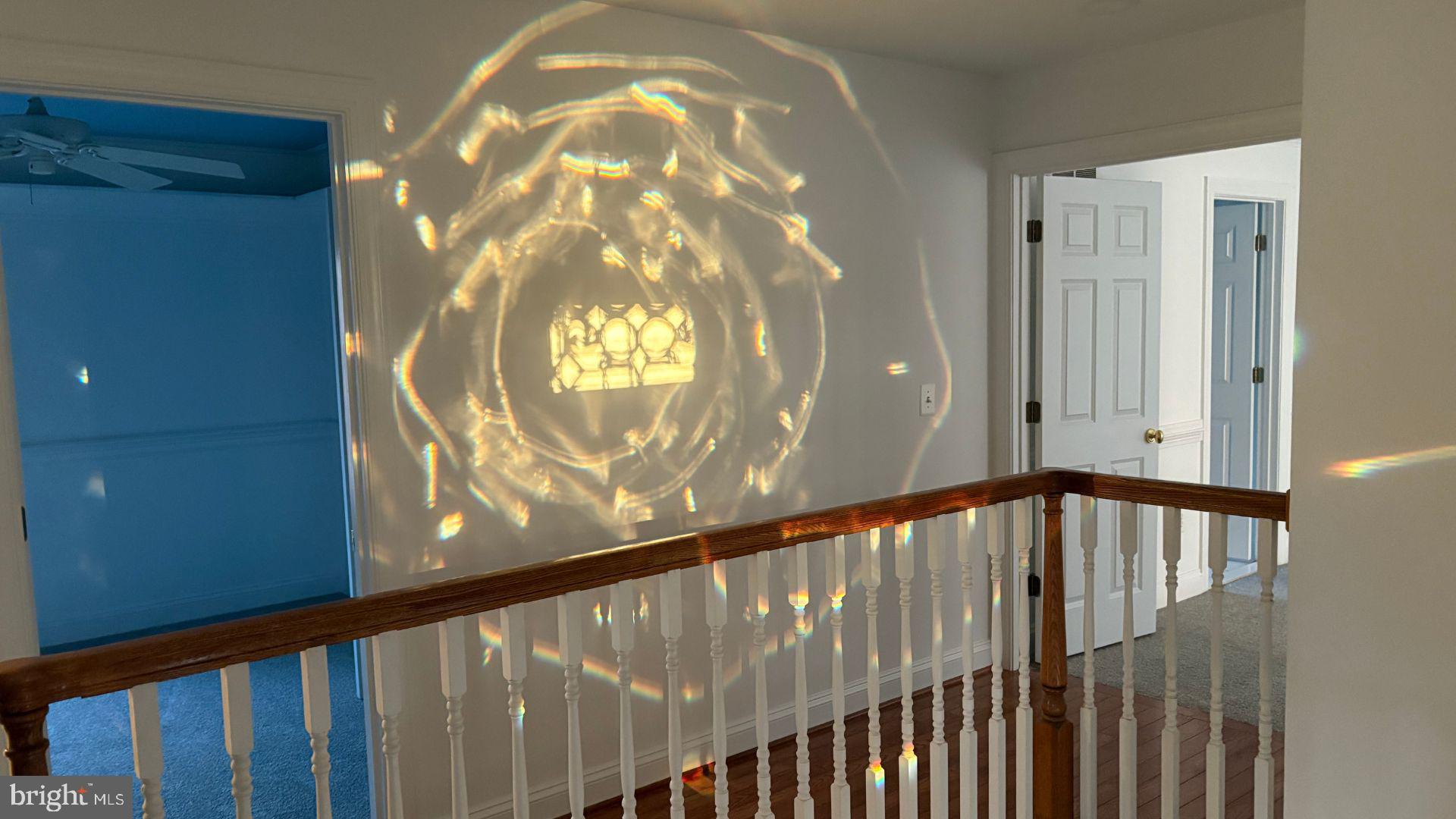 11112 Old Carriage Road Glen Arm, MD 21057 - Photo 54 of 83 Leaded Glass Reflecting the Morning Sun in Hallway