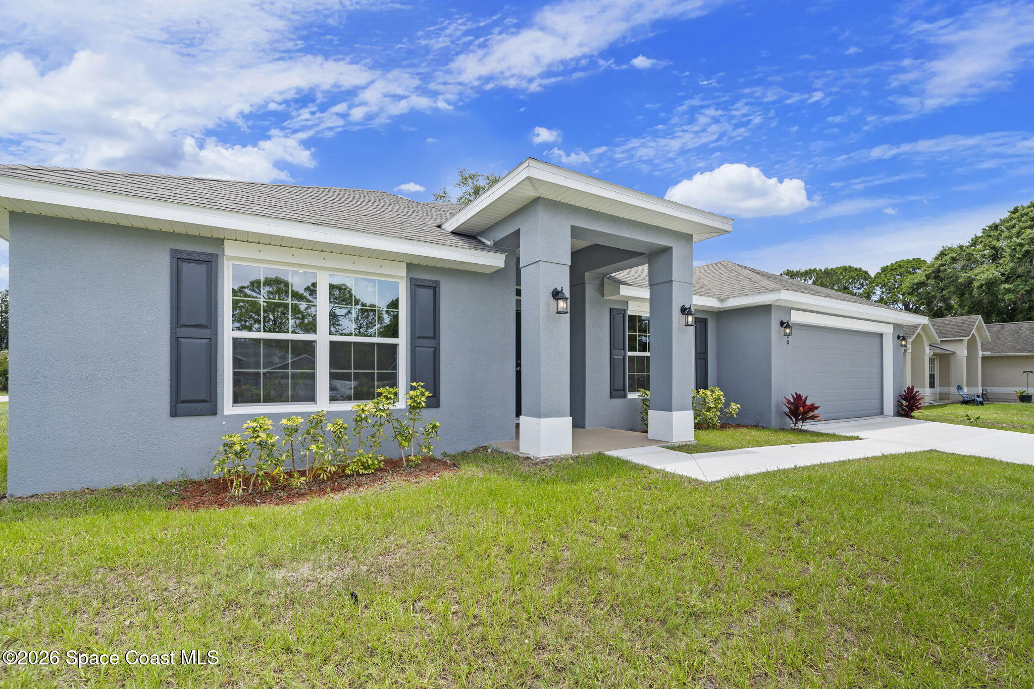 1107 Terry Road Southeast Palm Bay, FL 32909 - Photo 3 of 33 36-web-or-mls-920-lyons-cir-nw