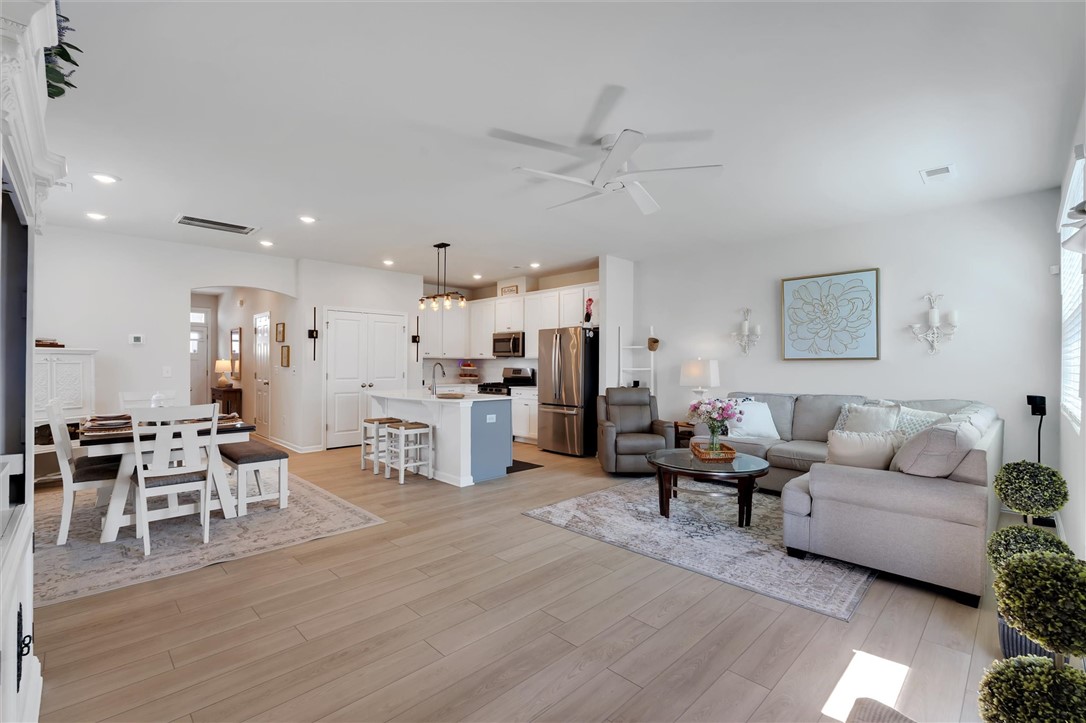 453 Bee Cv Way Pendleton, SC 29670 - Photo 2 of 25 An inviting open-concept living space seamlessly blends the kitchen, dining, and living areas.
