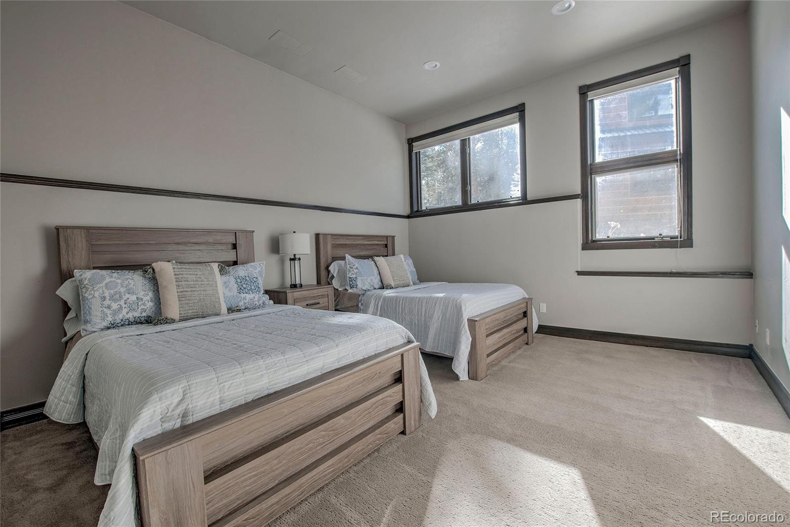 160 Fuller Placer Road Breckenridge, CO 80424 - Photo 23 of 47 a bedroom with bed and window