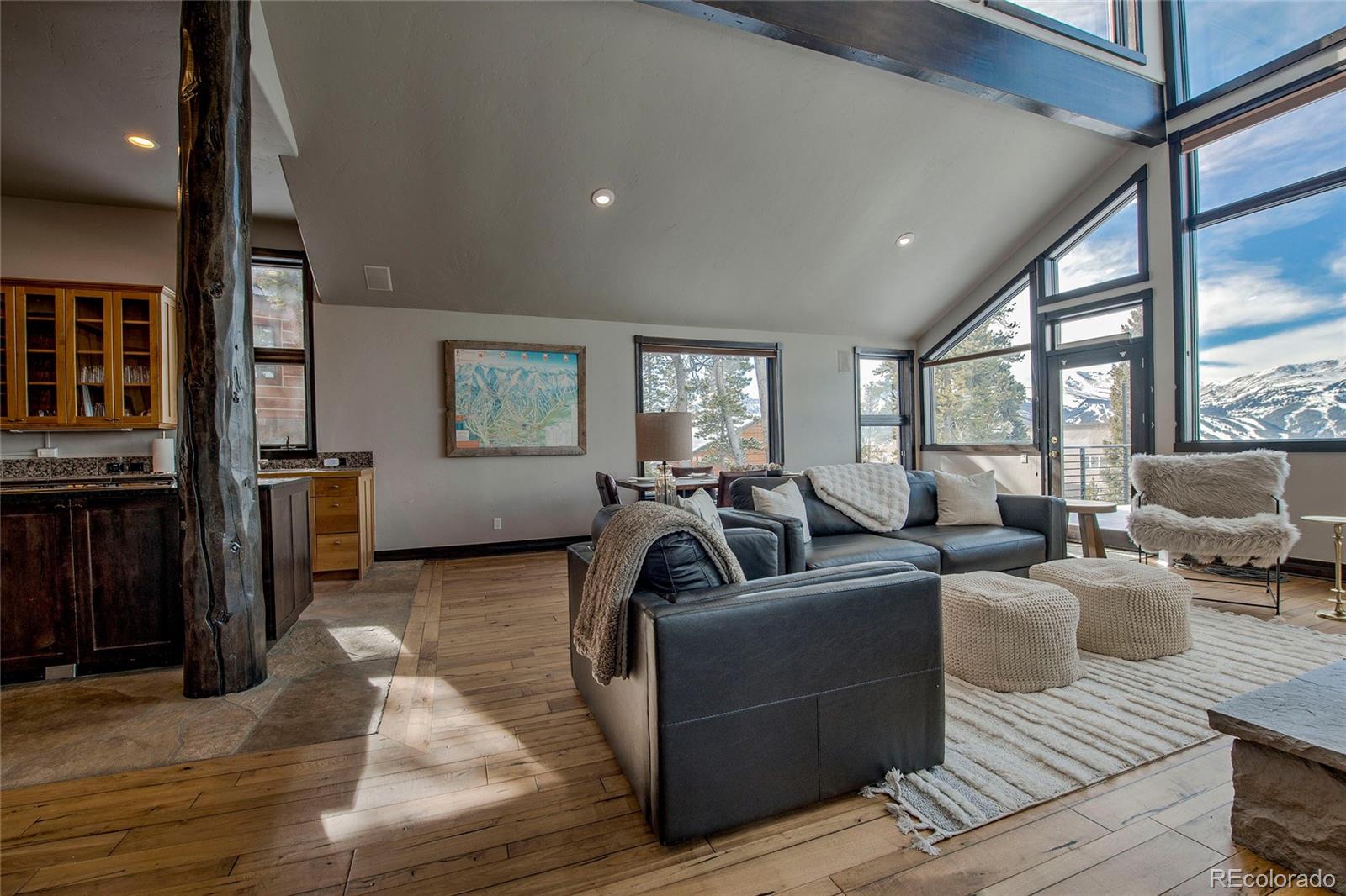 160 Fuller Placer Road Breckenridge, CO 80424 - Photo 27 of 47 a living room with furniture window and wooden floor