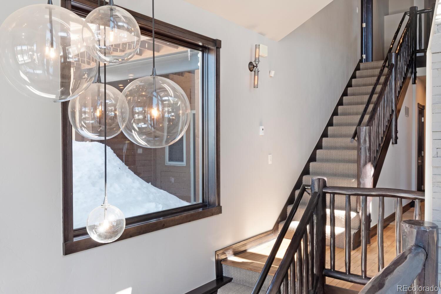 160 Fuller Placer Road Breckenridge, CO 80424 - Photo 29 of 47 a view of staircase with wooden floor