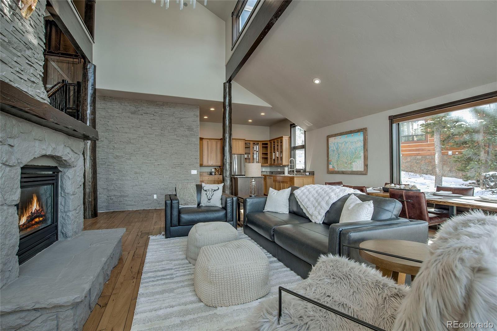 160 Fuller Placer Road Breckenridge, CO 80424 - Photo 10 of 47 a living room with furniture and a fireplace