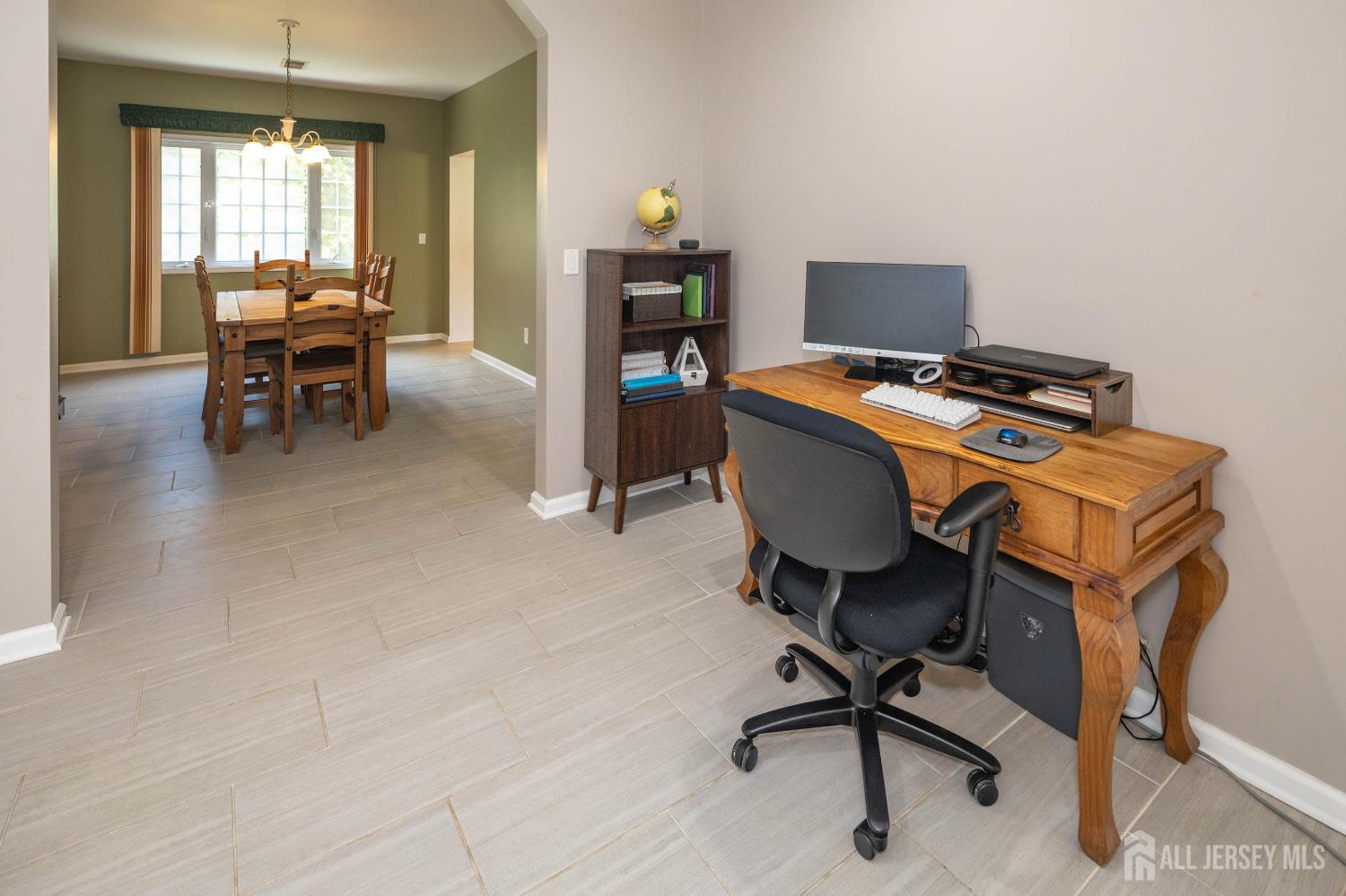 294 Fresh Ponds Road North Brunswick, NJ 08902 - Photo 20 of 53 a view of a workspace with furniture and a window