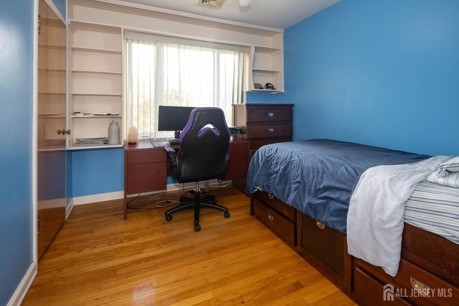294 Fresh Ponds Road North Brunswick, NJ 08902 - Photo 24 of 53 a bedroom with a bed and a window