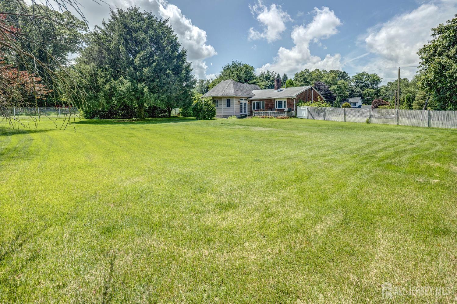 294 Fresh Ponds Road North Brunswick, NJ 08902 - Photo 39 of 53 a view of a house with a big yard