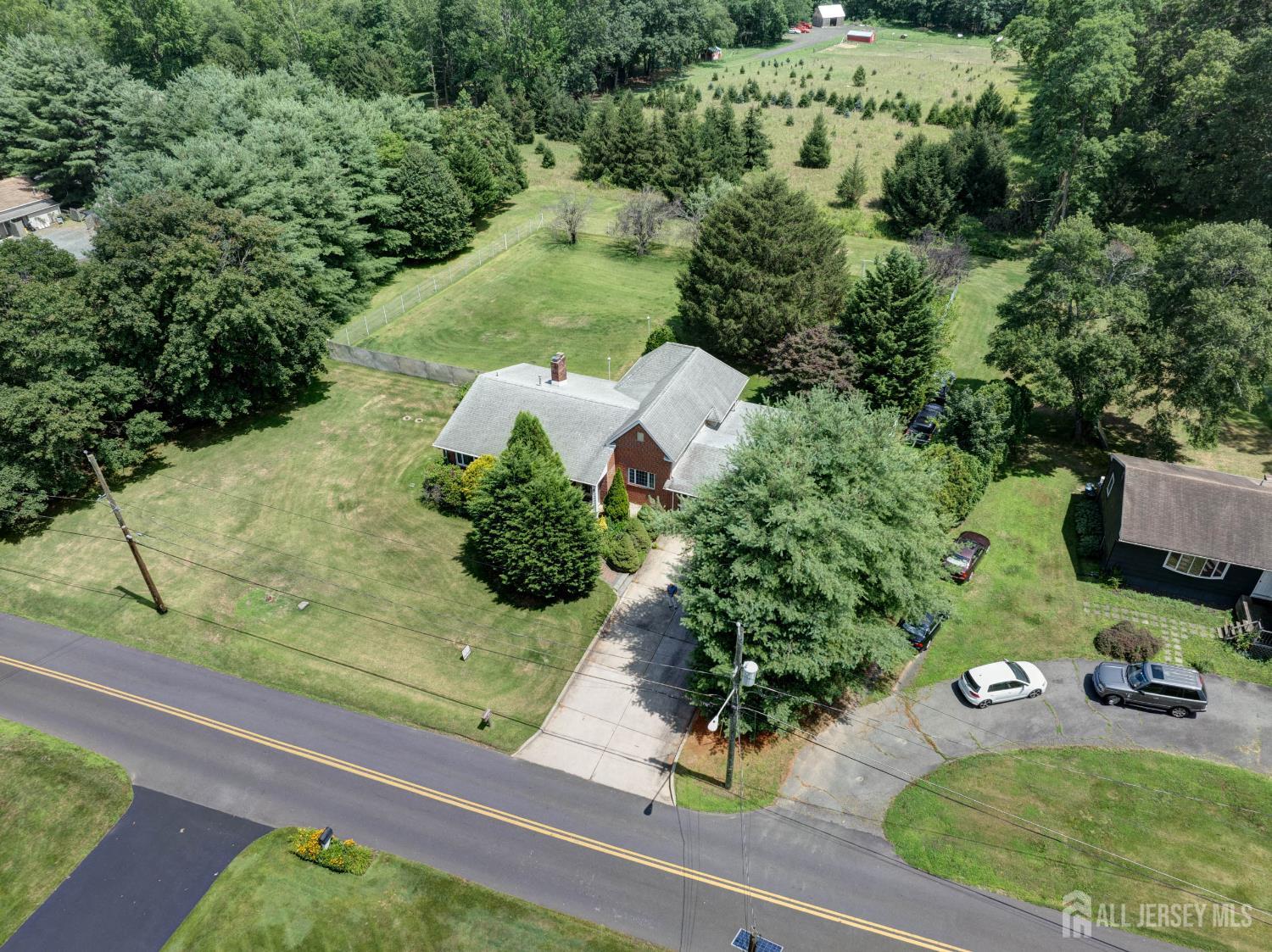 294 Fresh Ponds Road North Brunswick, NJ 08902 - Photo 42 of 53 an aerial view of a house with yard